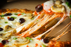 Slice of Vegetable Pizza with Melty Cheese